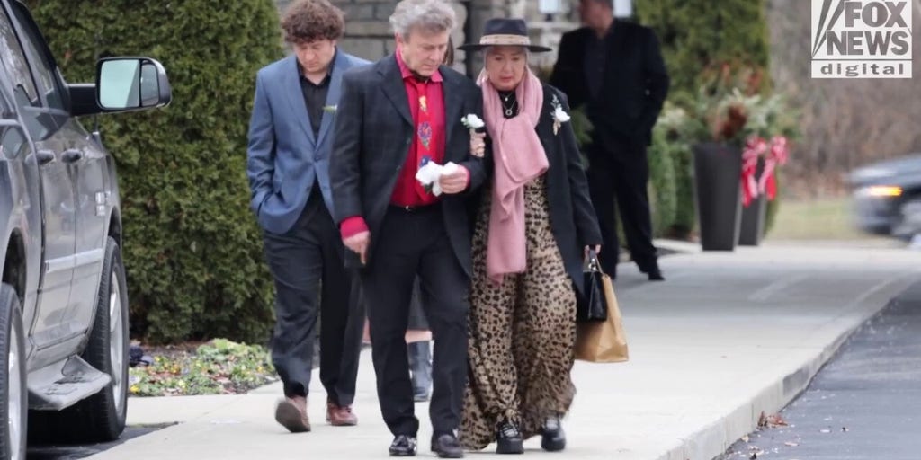 Mourners say goodbye to slain Ohio couple