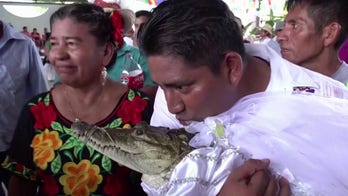In age-old ritual, Mexican mayor weds crocodile to secure abundance