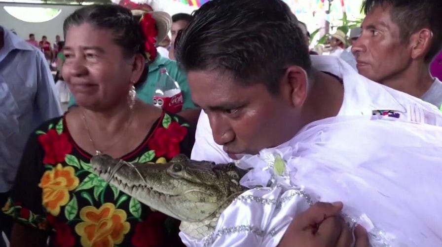 In age-old ritual, Mexican mayor weds alligatorid to secure abundance