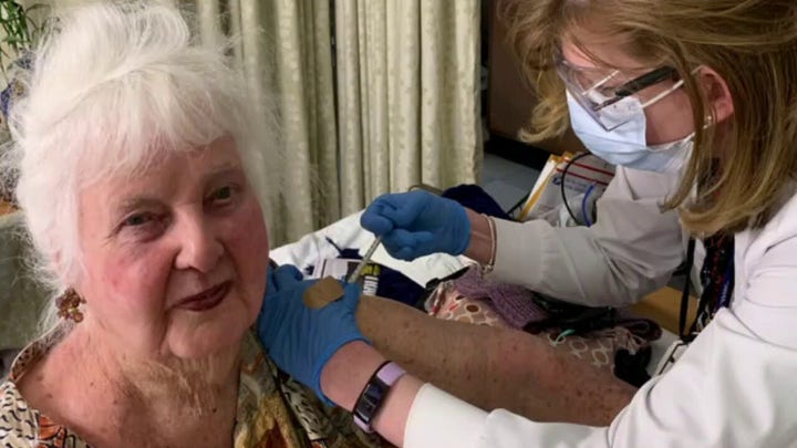 World War II veteran, 96, receives second COVID vaccine dose