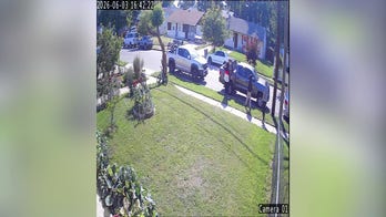Dramatic video shows former Marine fight off a group of teens who try and carjack him at gunpoint