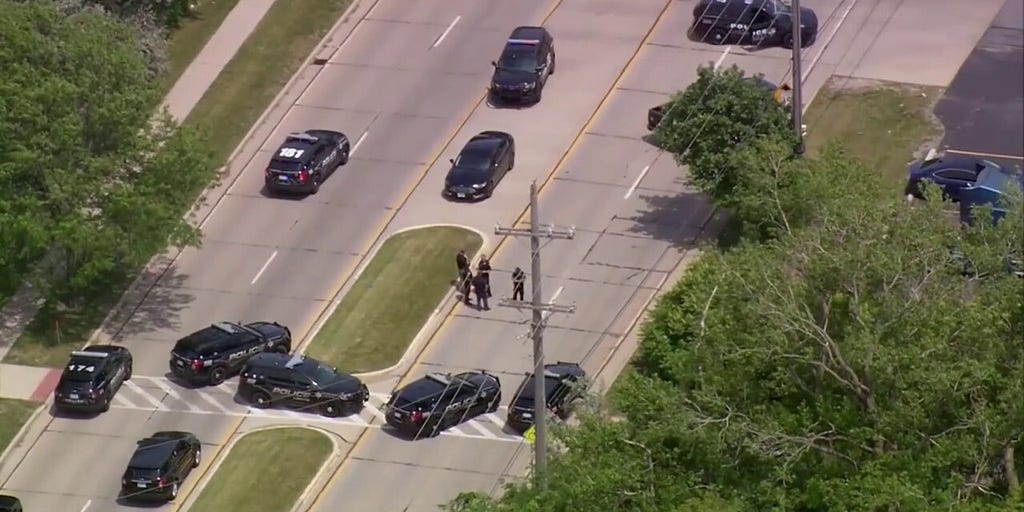 Police search for suspect after reported shooting in Lansing