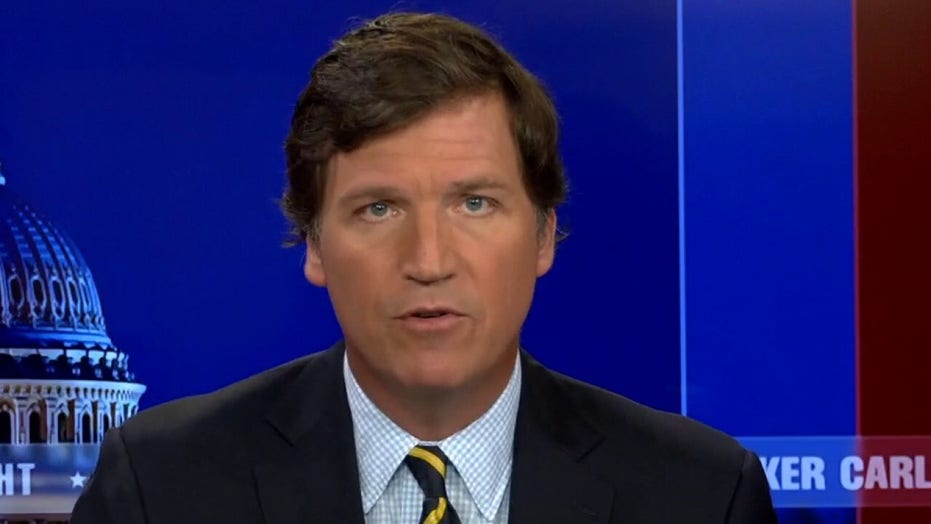 Tucker: COVID lunacy will end in 2022