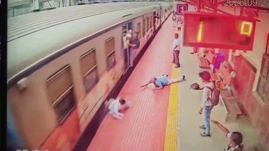 Terrifying video shows passenger dragged 50 meters before guard rushes to help