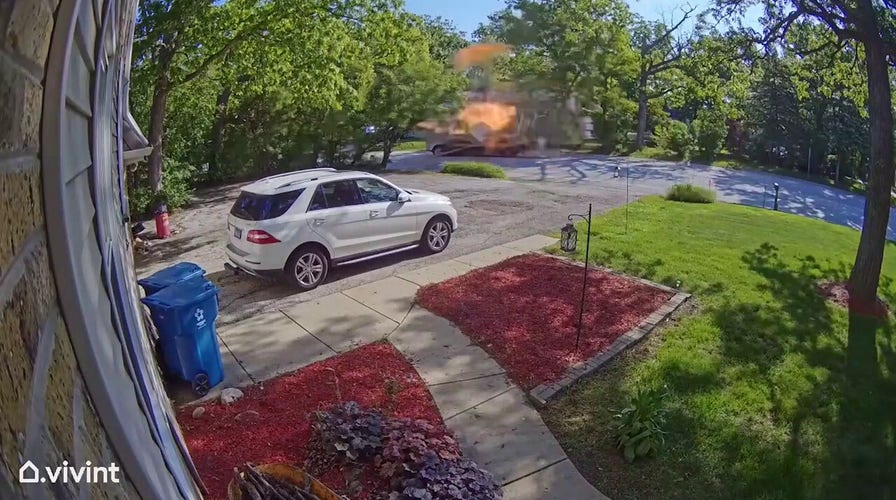 Truck explosion in suburban neighborhood damages homes, injures driver