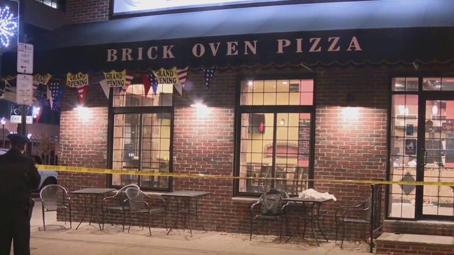 Philadelphia pizza worker's teen son shoots robbery suspect in the face