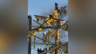 Mexican navy tall ship Cuauhtémoc crew dangle from rigging after striking NYC bridge