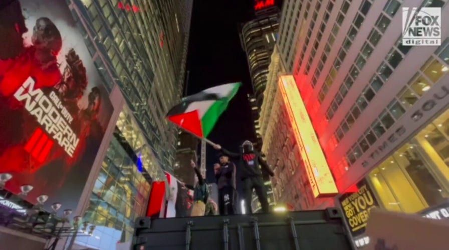Pro-Palestinian protesters seen at Penn Station in New York City