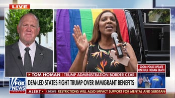 21 state AGs sue Trump admin to restore immigrant funding