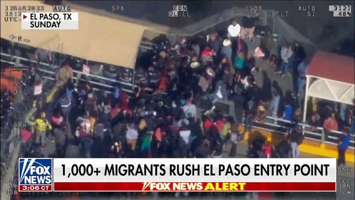 Video shows more than 1,000 migrants rushing El Paso border entry point.