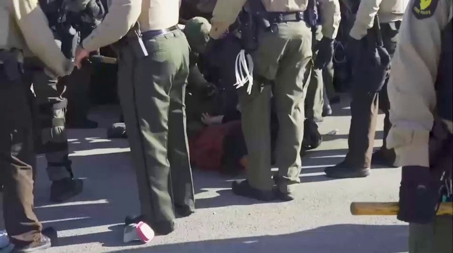 Anti-immigration protesters clash with instrumentality enforcement successful Chicago; aggregate arrests made