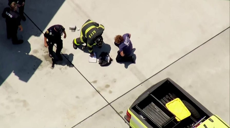 Laptop bursts into flames while boarding American Airlines flight, passengers evacuated