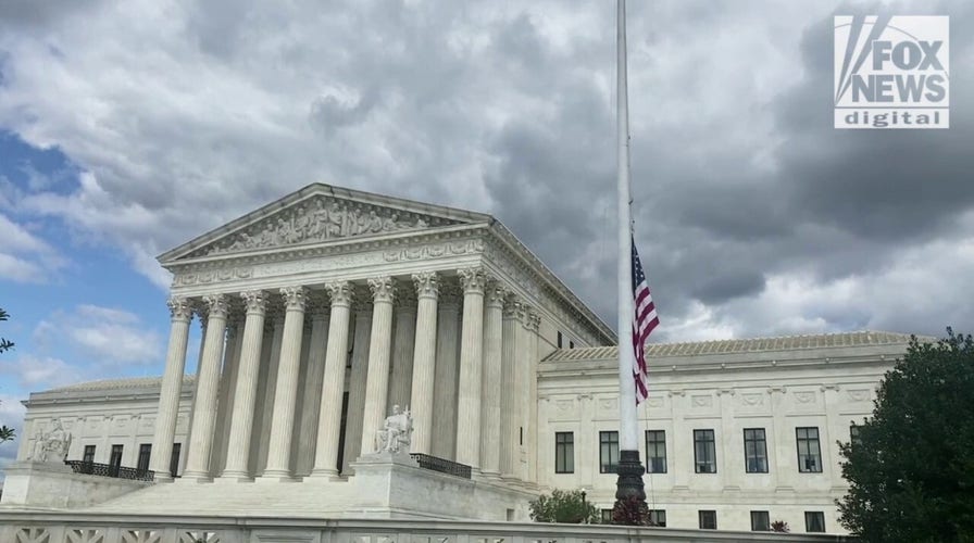 Flag outside the U.S. Supreme Court lowers to commemorate Queen Elizabeth II