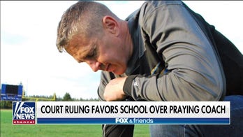 Football coach vows to keep fighting after legal setback over on-field prayer 