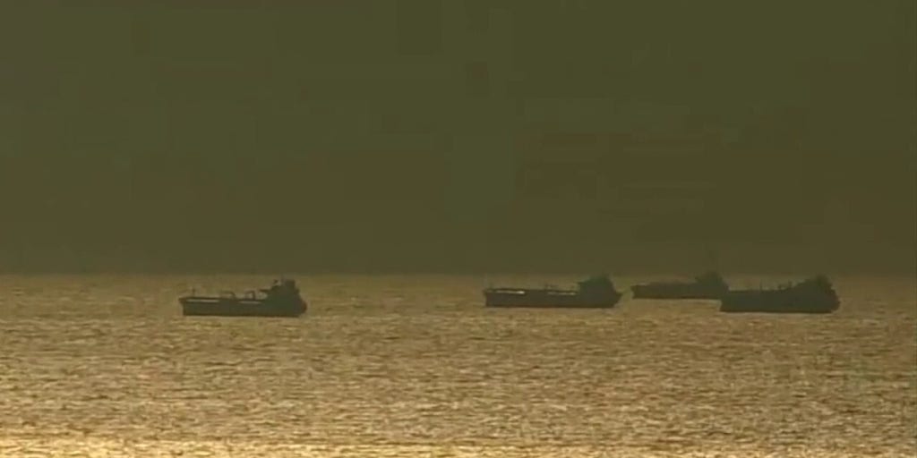 Container ships piling up offshore as US port strike threatens consumers, economy