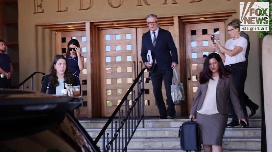 Alec Baldwin and wife Hilaria Baldwin depart their hotel in Santa Fe