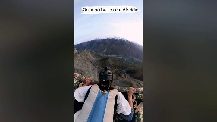 French man leaps off mountainside, 'flies' into air on carpet