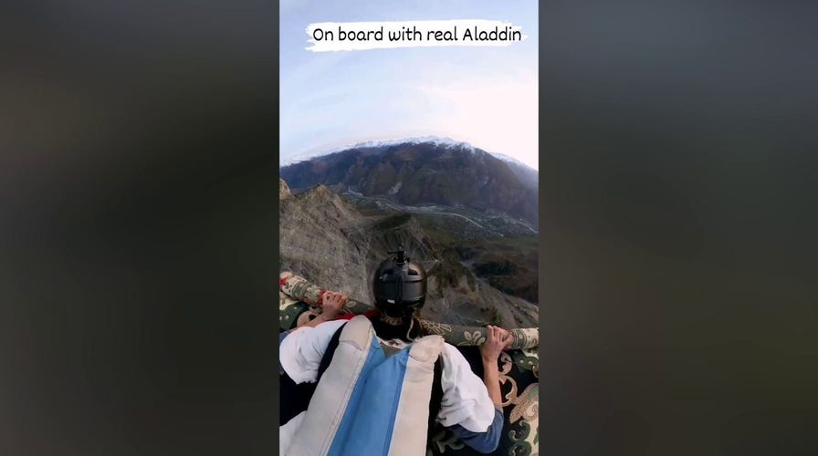 French man leaps off mountainside, 'flies' into air on carpet
