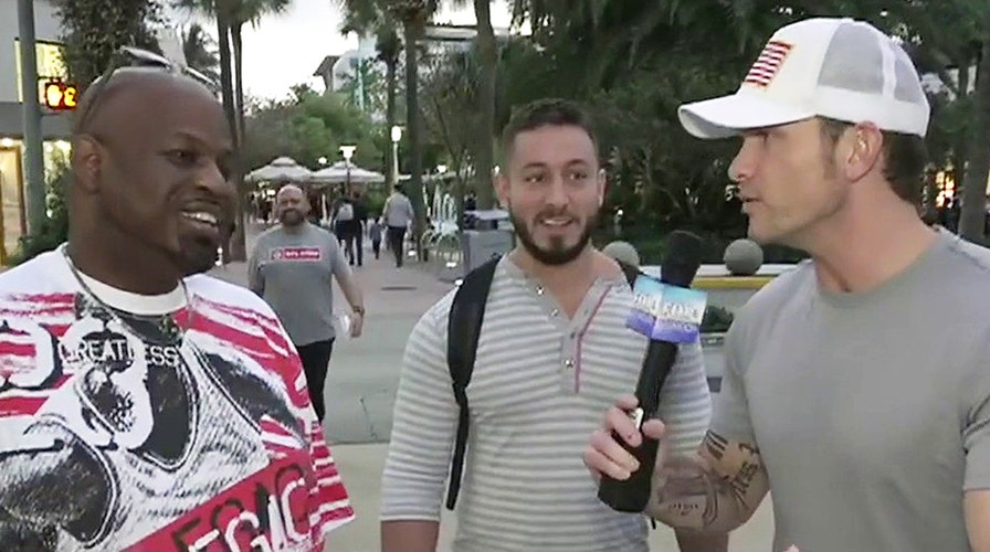 NFL fans in Miami say they're following the big game, not impeachment