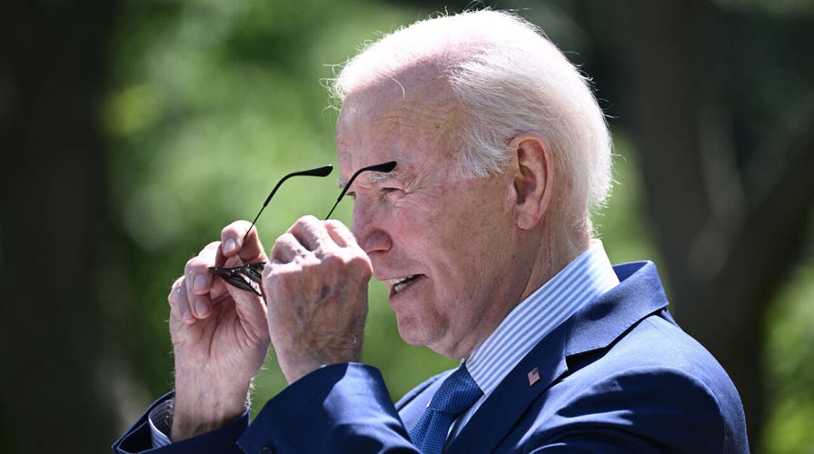 Biden jokes he's a 'very dull president', only known for his sunglasses and chocolate chip ice cream