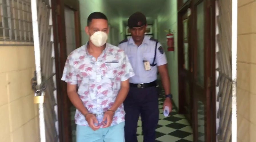 Bradley Dawson escorted to the cell block at the High Court in Lautoka, Fiji