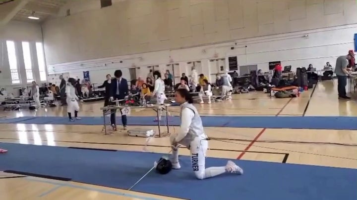 Women's fencer refuses to face transgender opponent at competition, taking a knee in protest