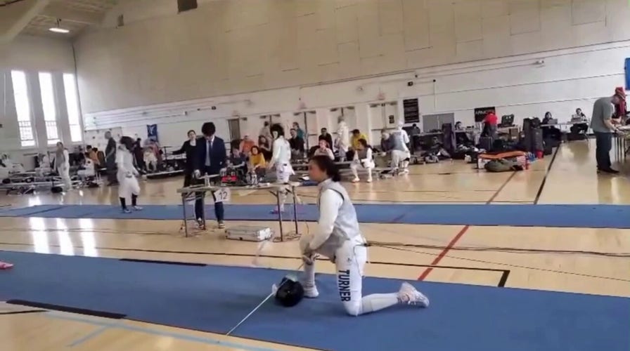 Women's fencer refuses to face transgender opponent at competition, taking a knee in protest