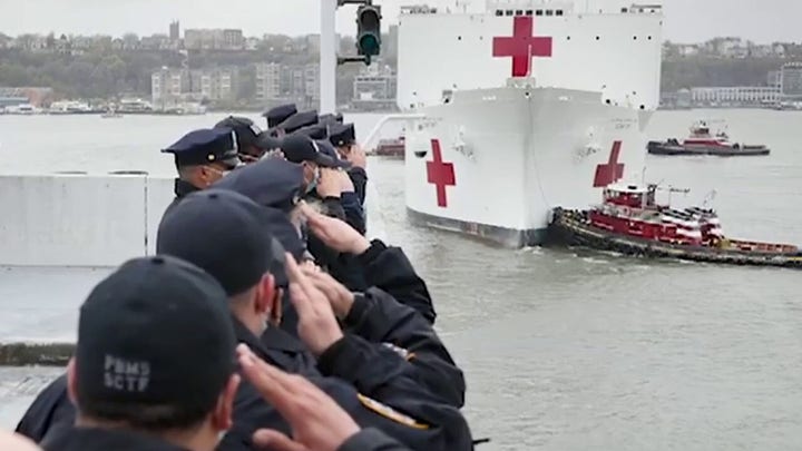 NYPD salutes USNS Comfort as it leaves New York City