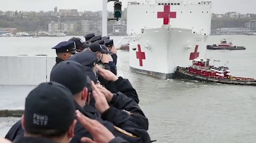 NYPD salutes USNS Comfort as it leaves New York City