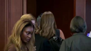 Woman accused of filming Lindsay Clancy jurors faces judge at arraignment