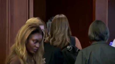 Woman accused of filming Lindsay Clancy jurors faces judge at arraignment