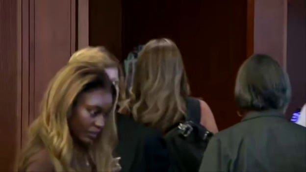 Woman accused of filming Lindsay Clancy jurors faces judge at arraignment