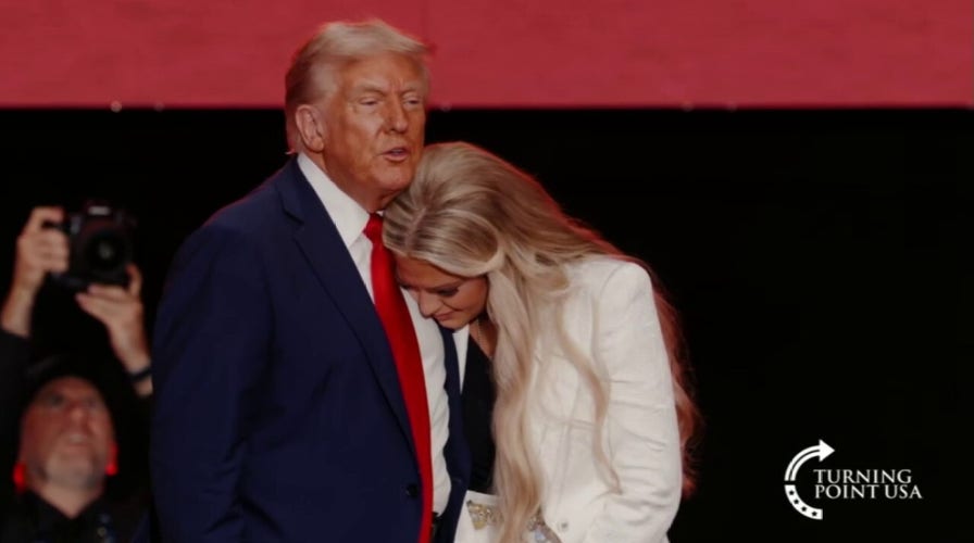Trump embraces Erika Kirk at memorial