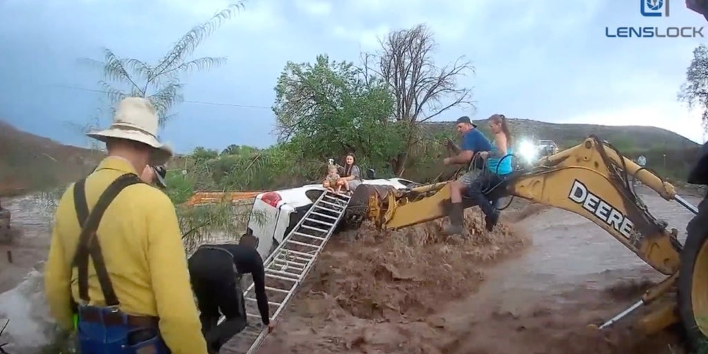 Rescue Nation: Heroic Flash Flood Rescue of Family and Dog Trapped in Overturned Truck