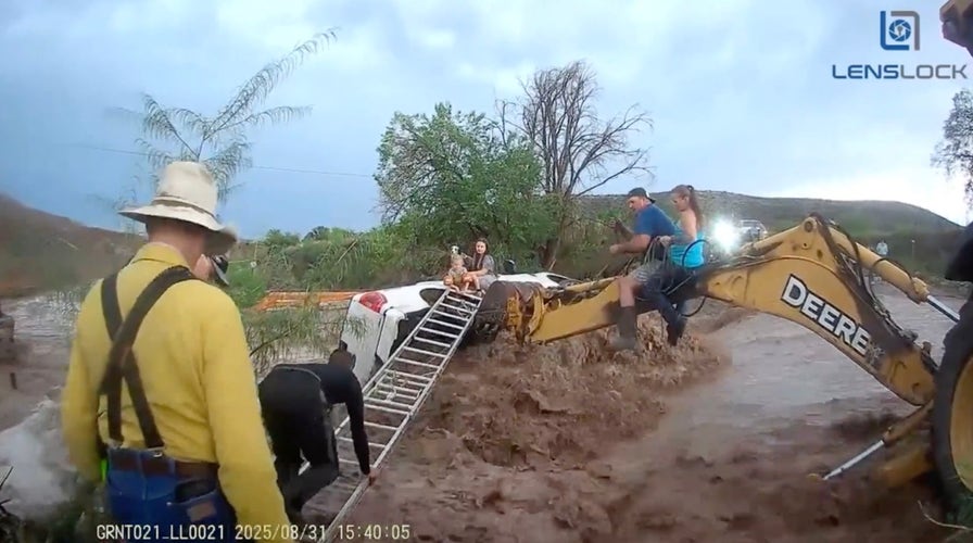 Rescue Nation: Heroic Flash Flood Rescue of Family and Dog Trapped in Overturned Truck