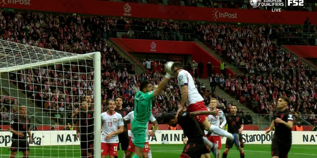 Poland's Robert Lewandowski converts header off corner kick for equalizer against Albania