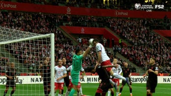Poland's Robert Lewandowski converts header off corner kick for equalizer against Albania