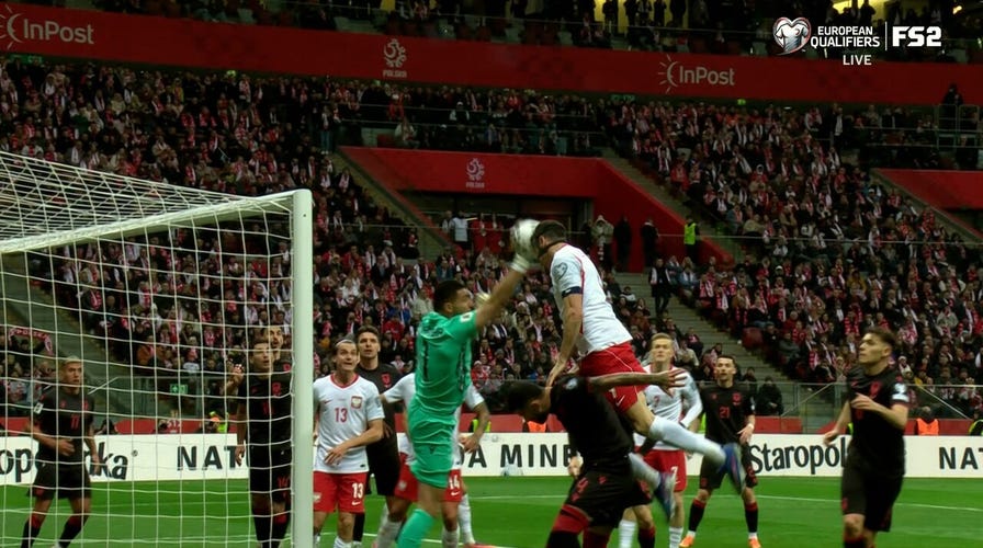 Poland's Robert Lewandowski converts header off corner kick for equalizer against Albania