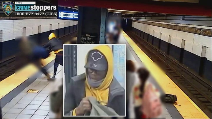 Video shows man shoving stranger onto Brooklyn subway tracks