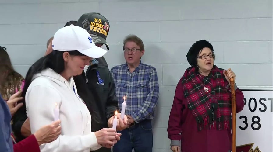 West Virginia assemblage  sings 'Amazing Grace' astatine  vigil for National Guard shooting victims
