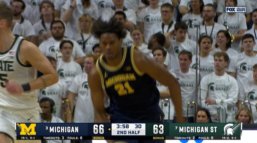 Morez Johnson Jr. throws down STRONG poster, extending Michigan's lead over Michigan State