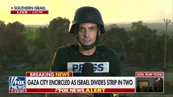 Israeli military surrounding Gaza City
