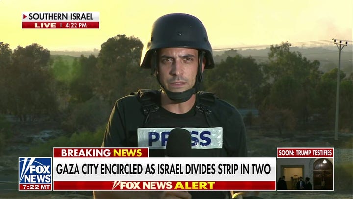 Israeli military surrounding Gaza City