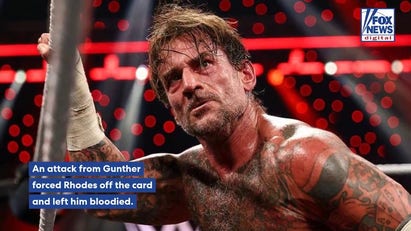 CM Punk captures Undisputed WWE Championship