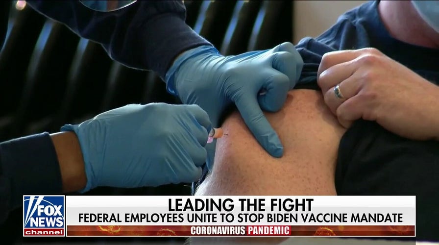 Vaccine mandate debate rages on as Biden declares COVID-19 pandemic 'over'