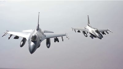 Air Force F-16 fighter jets refuel while flying over the Middle East - Fox News