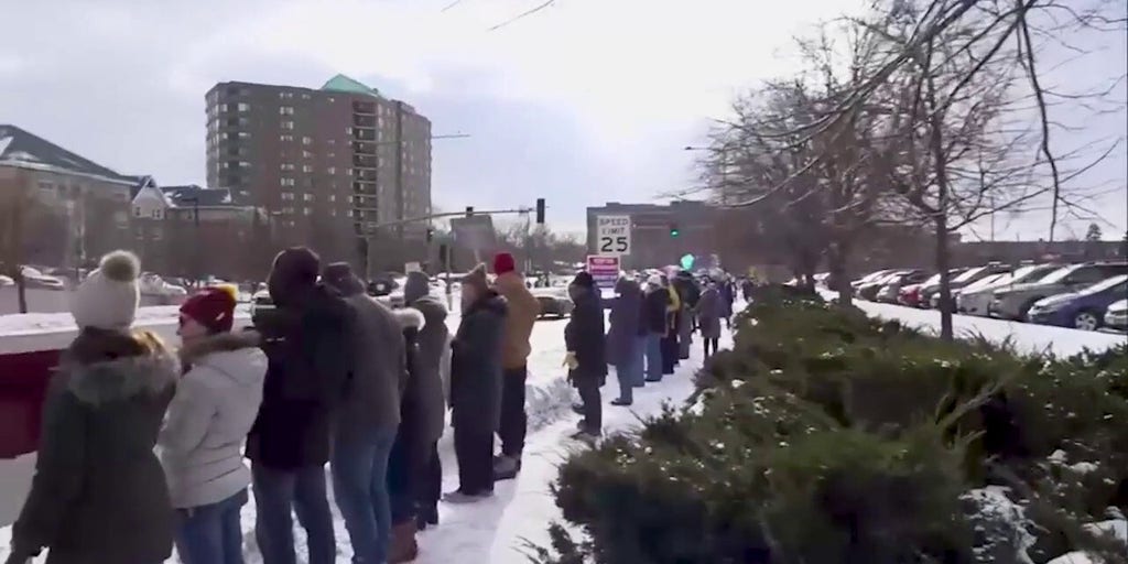 Hundreds of agitators march in Minneapolis Saturday days after ICE-involved shooting