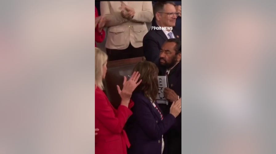 Dem appears to be escorted out of Trump’s SOTU
