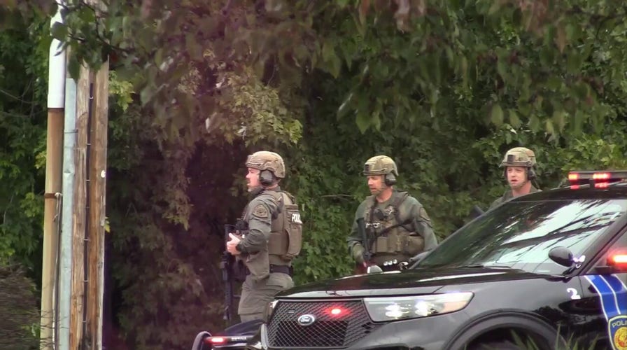 Police enter hotel where man was found shot to death in Poughkeepsie