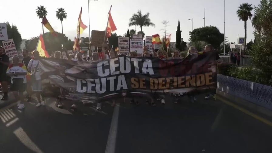 Tens of thousands protest migrant crisis across Spain